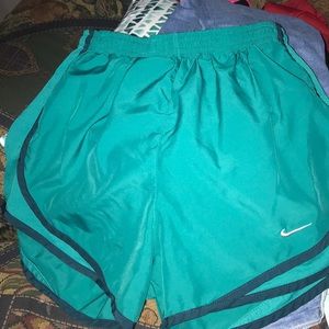 Greenish blueish Nike shorts
